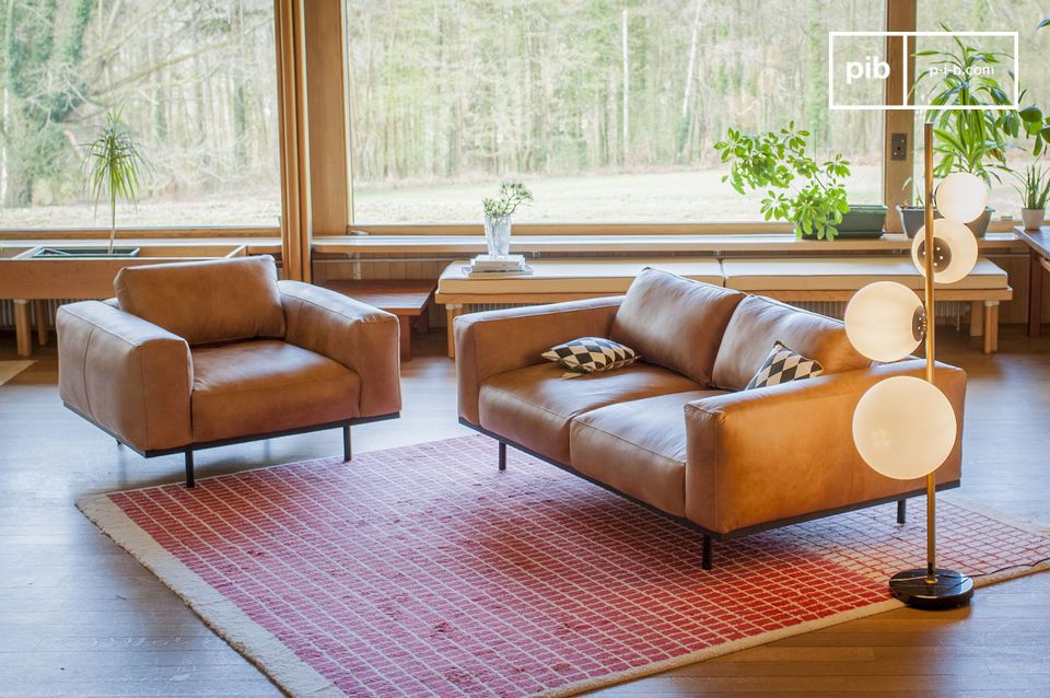 Kombinieren Sie Sessel und Sofa zu einer stilvollen Lounge.